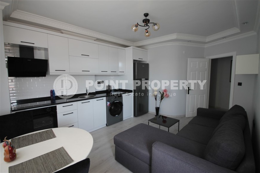 Квартира 1+1 с новой мебелью в центральной части Алании-id-8467-фото-6