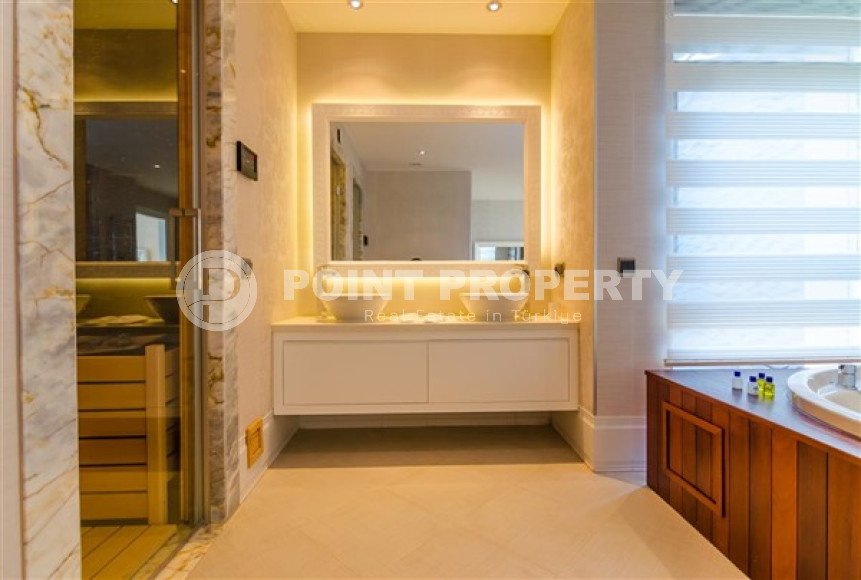 Элитная недвижимость в Алании: шикарная трехэтажная вилла 5+1, 520м², в уникальной резиденции в Конаклы.-id-1663-фото-71