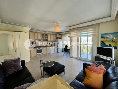 Квартира 1+1 в центре Алании с открытым видам на горы-id-8472-фото-3