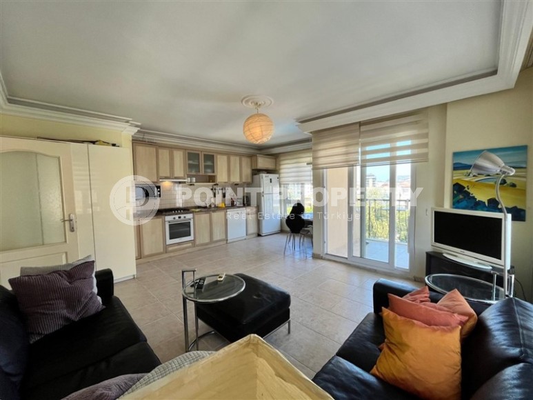 Квартира 1+1 в центре Алании с открытым видам на горы-id-8472-фото-3