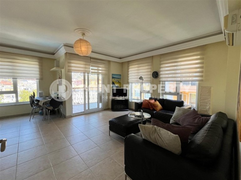 Квартира 1+1 в центре Алании с открытым видам на горы-id-8472-фото-4