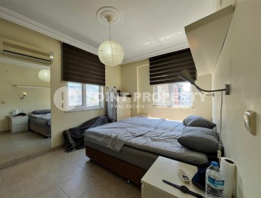 Квартира 1+1 в центре Алании с открытым видам на горы-id-8472-фото-5