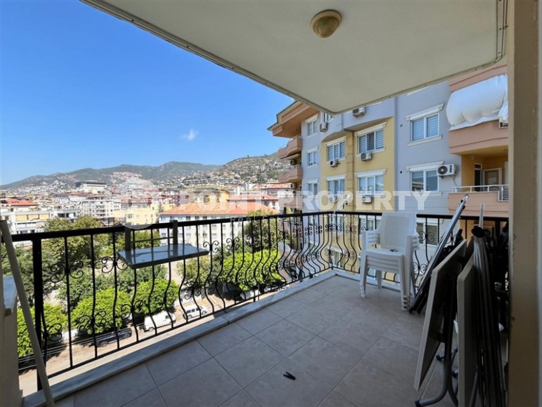 Квартира 1+1 в центре Алании с открытым видам на горы-id-8472-фото-9