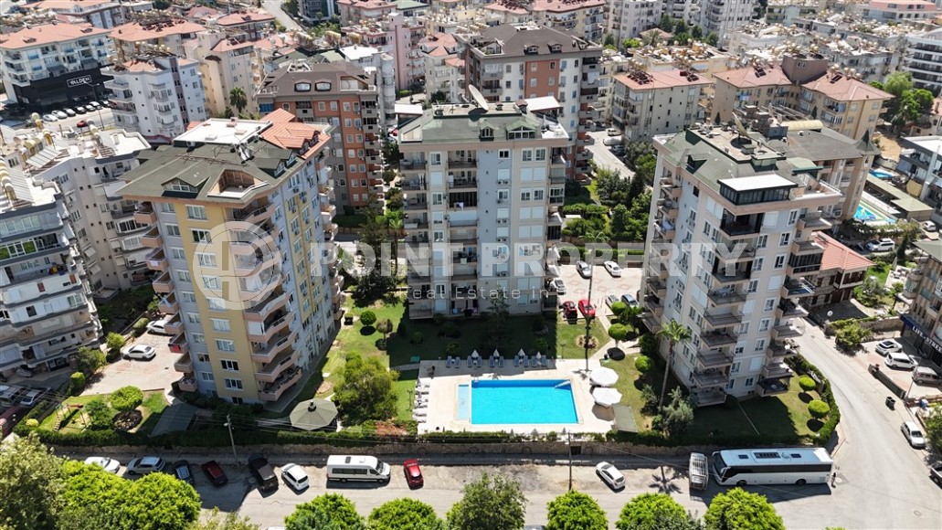 Квартира 1+1 в центре Алании с открытым видам на горы-id-8472-фото-15