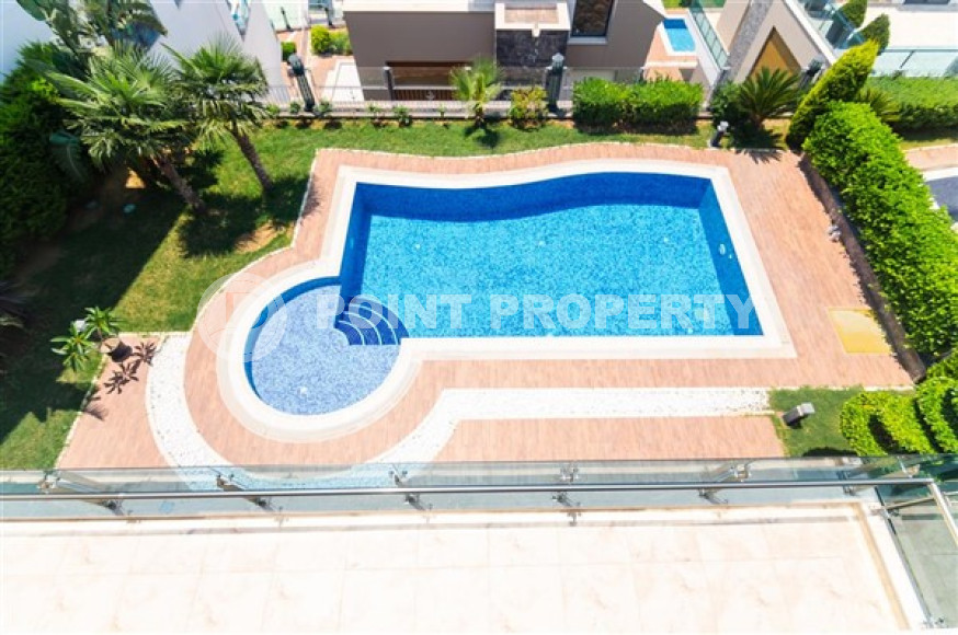 Элитная недвижимость в Алании: шикарная трехэтажная вилла 5+1, 520м², в уникальной резиденции в Конаклы.-id-1663-фото-80