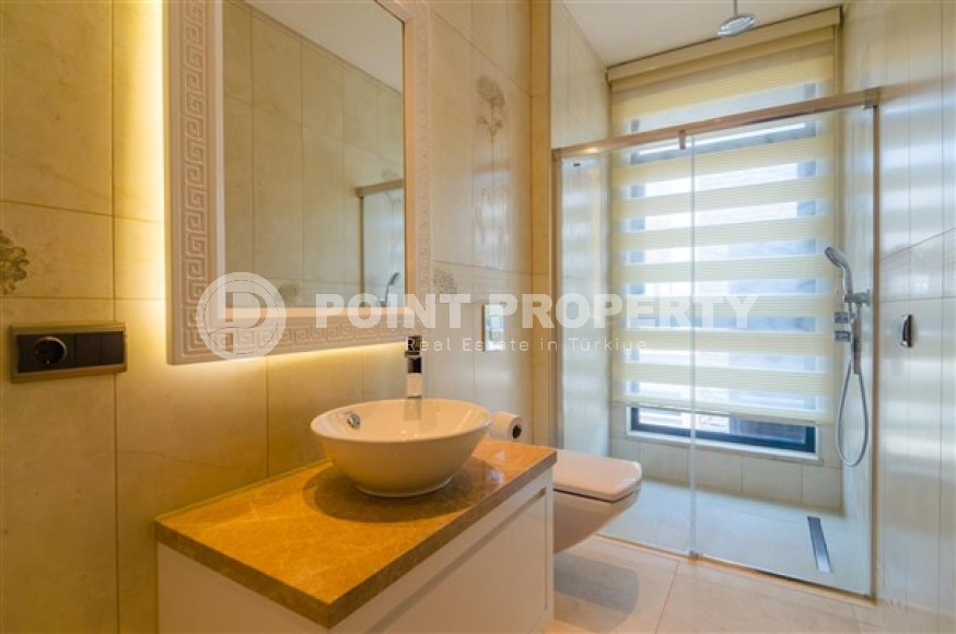 Элитная недвижимость в Алании: шикарная трехэтажная вилла 5+1, 520м², в уникальной резиденции в Конаклы.-id-1663-фото-83