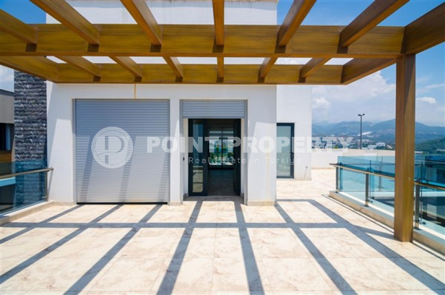 Элитная недвижимость в Алании: шикарная трехэтажная вилла 5+1, 520м², в уникальной резиденции в Конаклы.-id-1663-фото-88