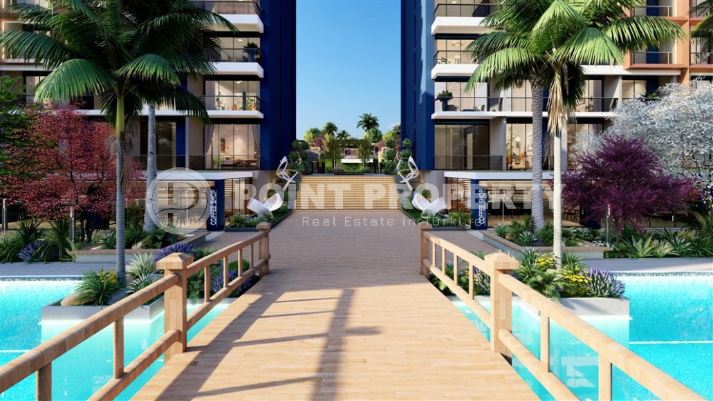 Новый проект в Мерсине: комфортные квартиры и дуплексы в районе Томюк-id-8482-photo-19