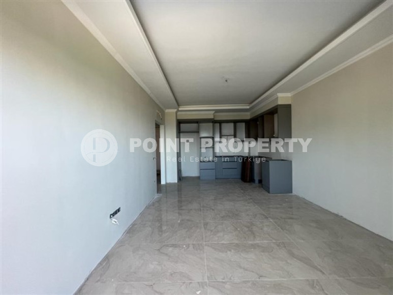 Квартира 1+1, 63м², в комплексе с обширной инфраструктурой на окончательном этапе строительства, в Каргыджаке, Алания-id-1664-фото-15