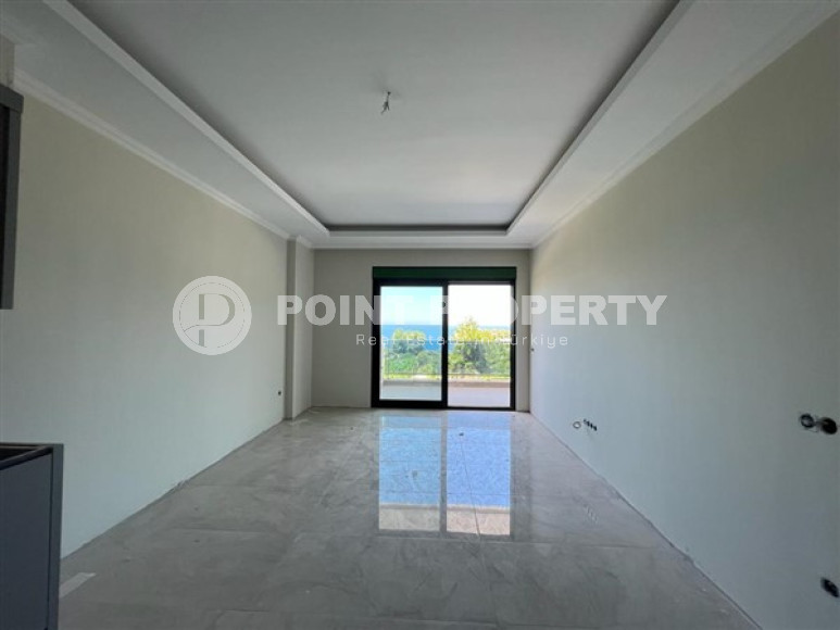 Квартира 1+1, 63м², в комплексе с обширной инфраструктурой на окончательном этапе строительства, в Каргыджаке, Алания-id-1664-фото-16