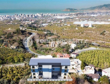One bedroom apartment, 51m² in a residence under construction, at the foot of the mountains in Mahmutlar, Alanya-id-1665-photo-3