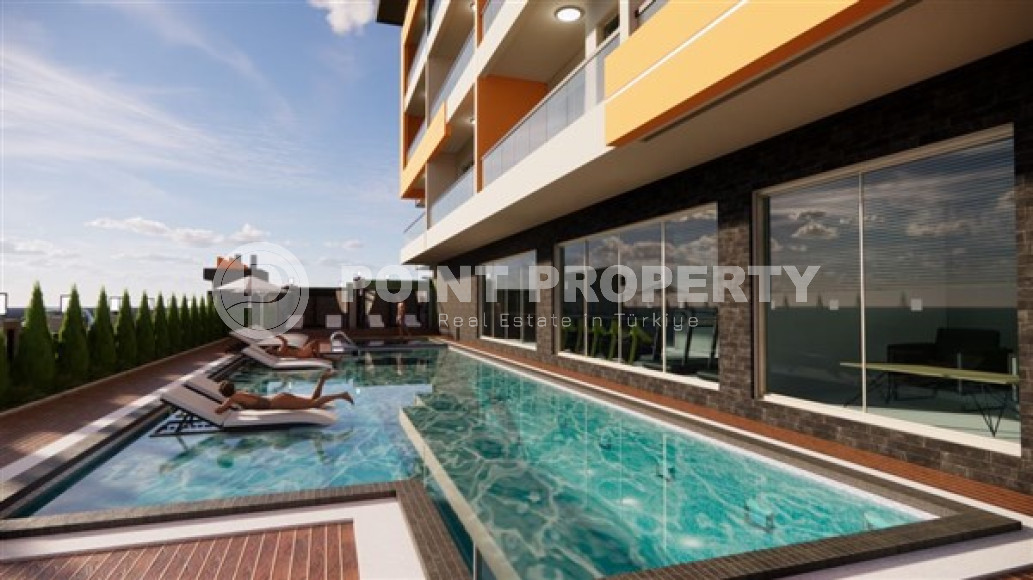 One bedroom apartment, 51m² in a residence under construction, at the foot of the mountains in Mahmutlar, Alanya-id-1665-photo-11