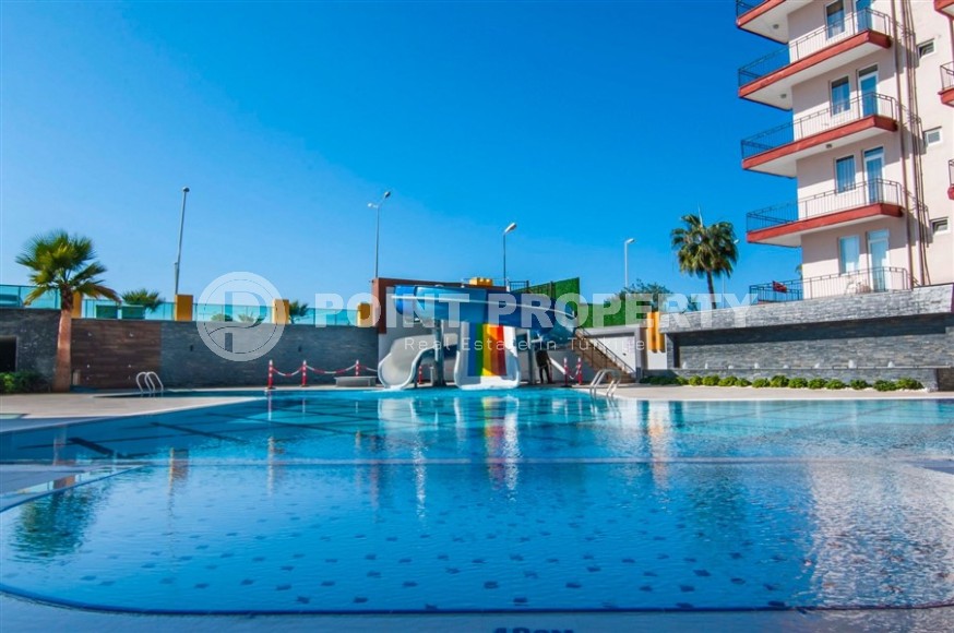 Панорамная квартира 60 м² на берегу моря в Махмутларе-id-8509-фото-14