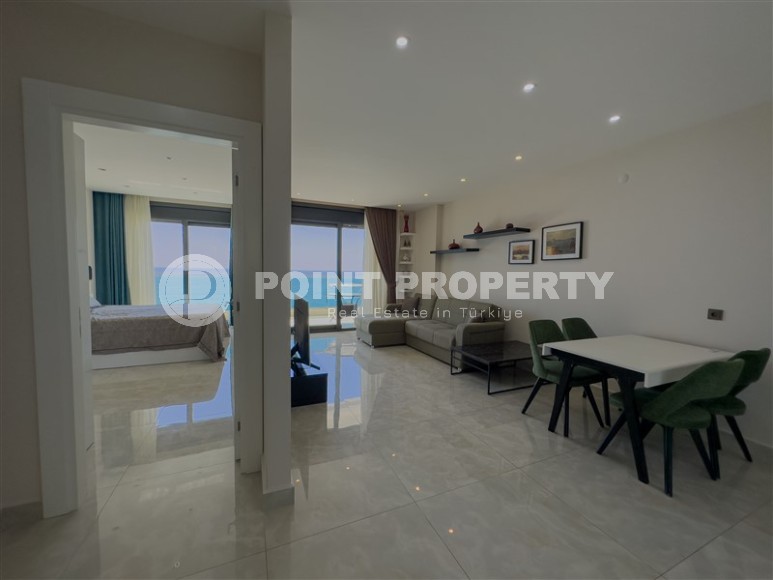 Панорамная квартира 60 м² у моря в Махмутларе-id-8511-фото-2