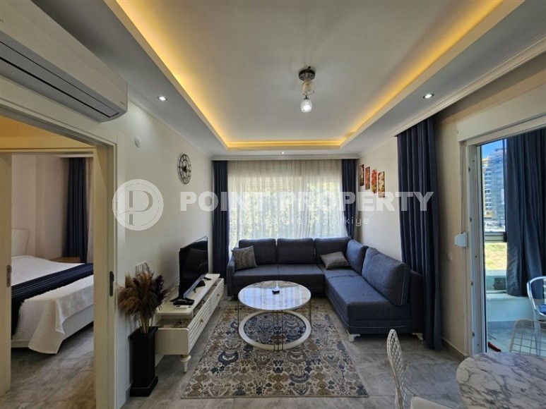 Стильная квартира 55 м² в ухоженном комплексе в Махмутларе-id-8514-фото-6