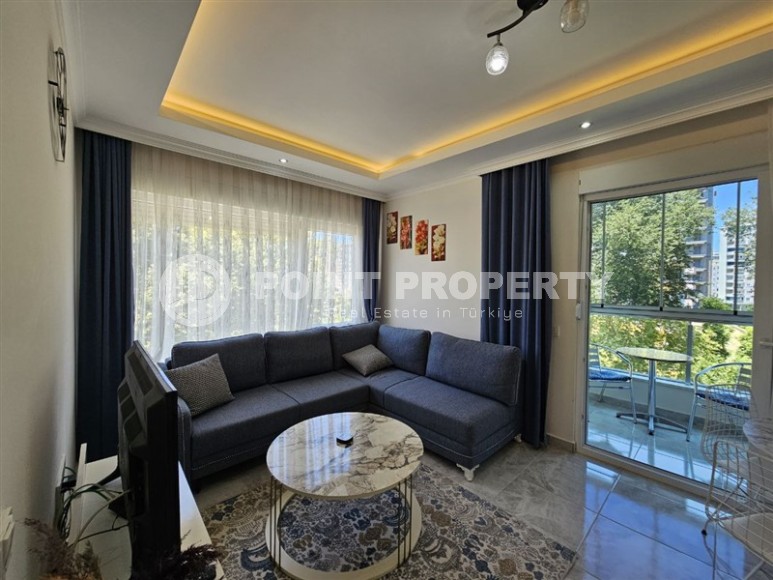 Стильная квартира 55 м² в ухоженном комплексе в Махмутларе-id-8514-фото-7