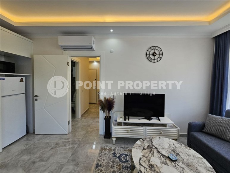 Стильная квартира 55 м² в ухоженном комплексе в Махмутларе-id-8514-фото-8