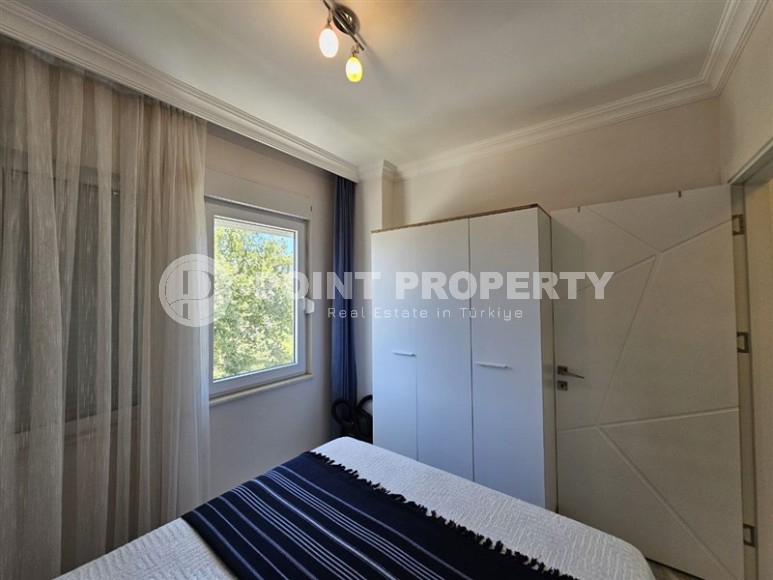 Стильная квартира 55 м² в ухоженном комплексе в Махмутларе-id-8514-фото-10