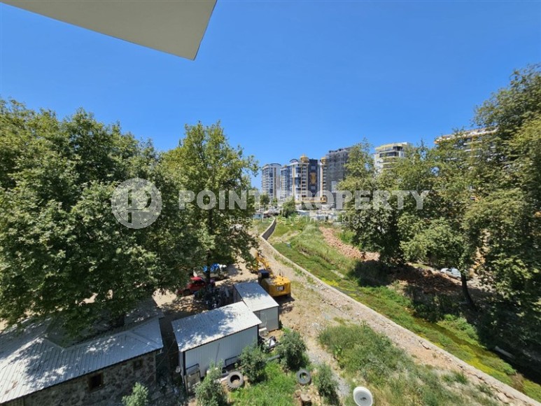 Стильная квартира 55 м² в ухоженном комплексе в Махмутларе-id-8514-фото-15