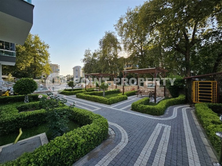 Стильная квартира 55 м² в ухоженном комплексе в Махмутларе-id-8514-фото-17