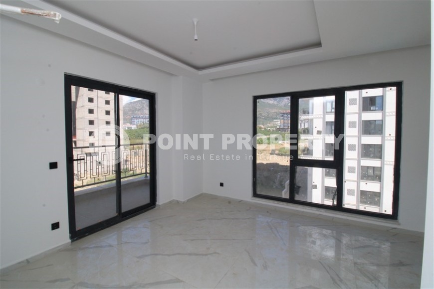 Новая квартира 47 м² в современном комплексе в Махмутларе-id-8528-photo-2