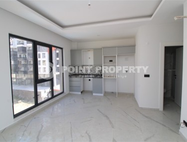 Новая квартира 47 м² в современном комплексе в Махмутларе-id-8528-фото-3