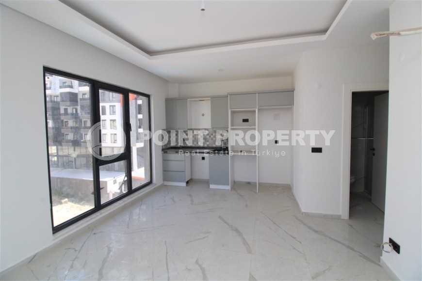 Новая квартира 47 м² в современном комплексе в Махмутларе-id-8528-photo-3