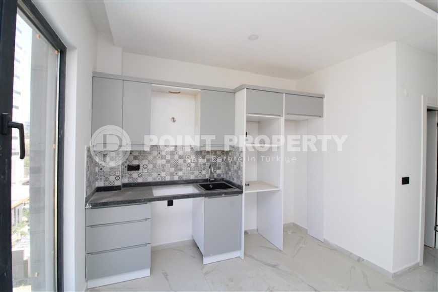 Новая квартира 47 м² в современном комплексе в Махмутларе-id-8528-photo-4