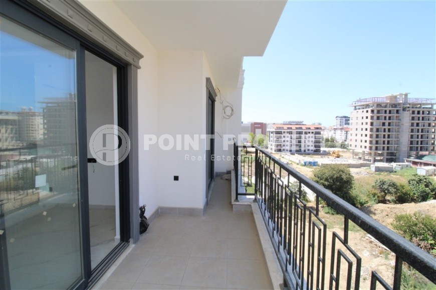 Новая квартира 47 м² в современном комплексе в Махмутларе-id-8528-photo-8