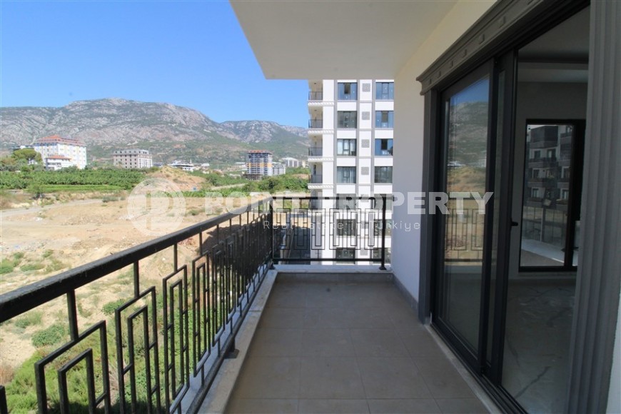 Новая квартира 47 м² в современном комплексе в Махмутларе-id-8528-photo-9