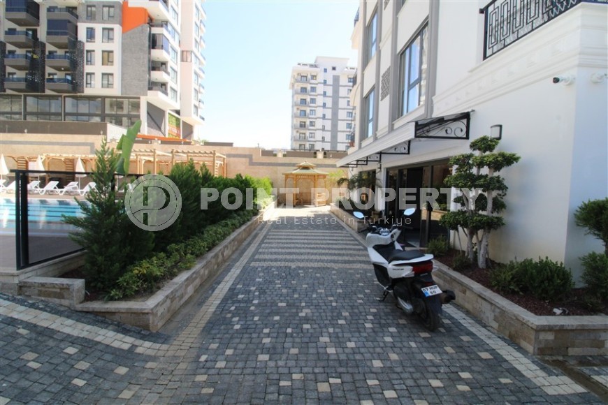 Новая квартира 47 м² в современном комплексе в Махмутларе-id-8528-photo-16