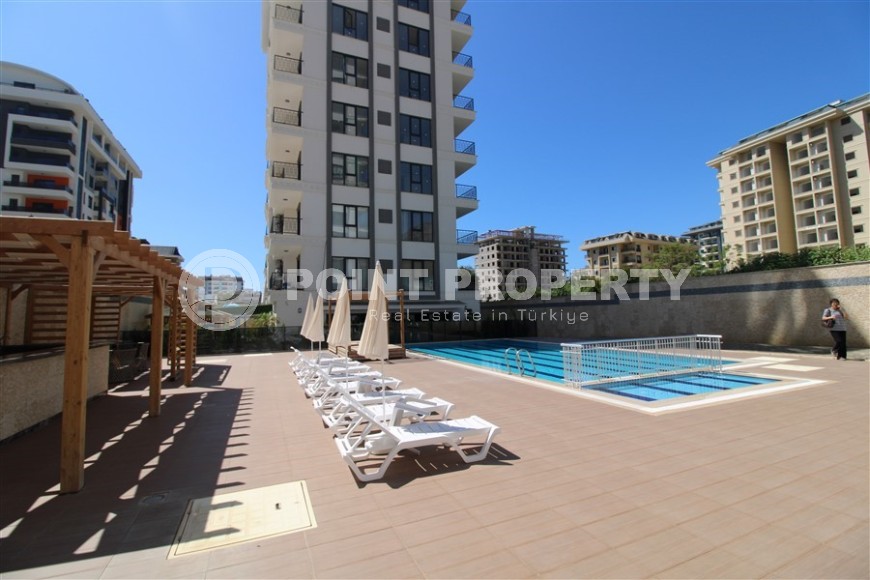 Новая квартира 47 м² в современном комплексе в Махмутларе-id-8528-photo-20