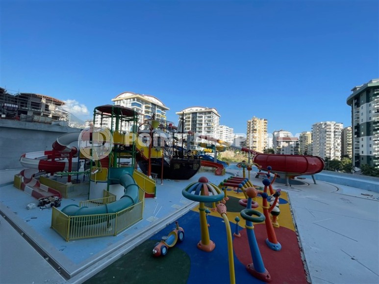 Современная квартира 127,70 м² в премиум-резиденции в Махмутларе-id-8529-photo-13