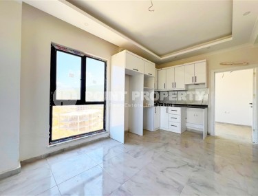 Недорогая квартира с чистовой отделкой в двух километрах от моря, в спокойном районе Аланьи - Демирташ-id-8122-фото-3