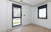 Двухкомнатные квартиры, 60м², в строящемся комплексе с хорошей инфраструктурой в районе Лара, Анталия-id-1842-фото-9