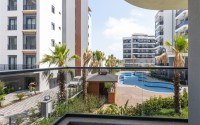 Двухкомнатные квартиры, 60м², в строящемся комплексе с хорошей инфраструктурой в районе Лара, Анталия-id-1842-фото-19