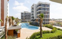 Двухкомнатные квартиры, 60м², в строящемся комплексе с хорошей инфраструктурой в районе Лара, Анталия-id-1842-фото-20