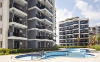 Двухкомнатные квартиры, 60м², в строящемся комплексе с хорошей инфраструктурой в районе Лара, Анталия-id-1842-фото-24