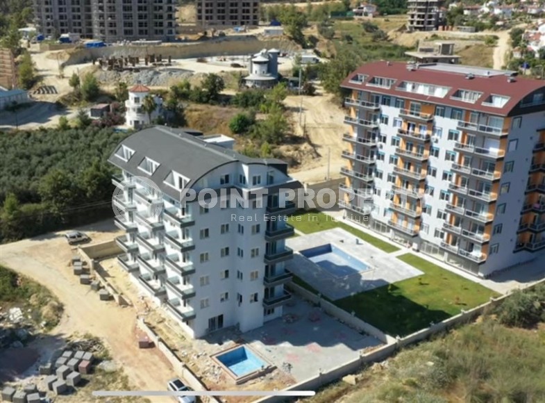 Apartment 1+1, 55m², in a complex at the final stage of construction in Avsallar, Alanya-id-1738-photo-13