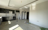 Apartment 1+1, 49 m², in a complex with infrastructure at the commissioning stage in the Oba area, Alanya-id-1668-photo-2