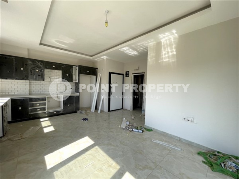 Apartment 1+1, 49 m², in a complex with infrastructure at the commissioning stage in the Oba area, Alanya-id-1668-photo-2