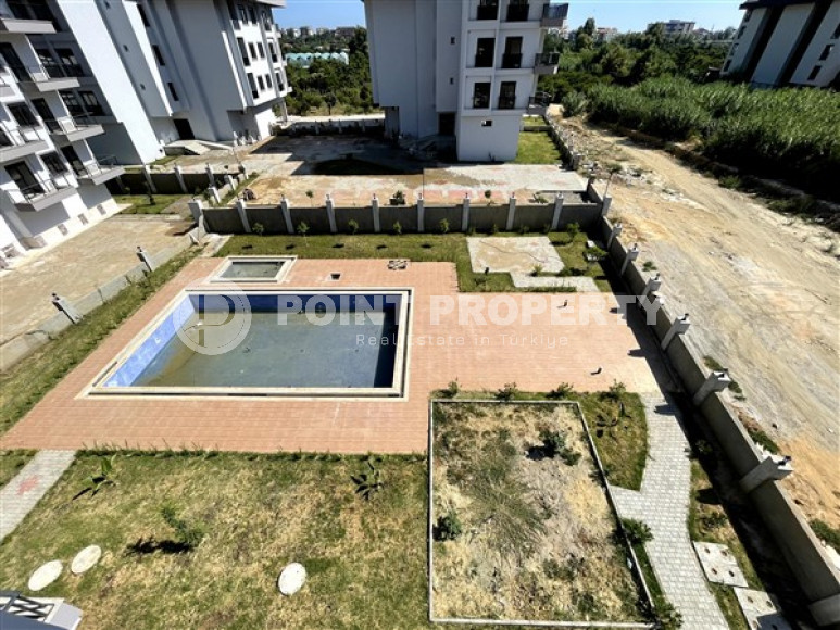 Apartment 1+1, 49 m², in a complex with infrastructure at the commissioning stage in the Oba area, Alanya-id-1668-photo-10