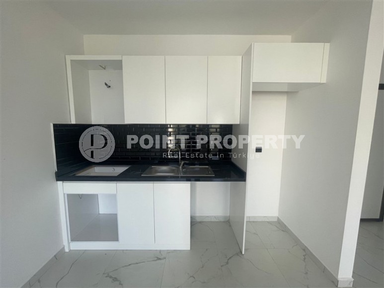 Бюджетная квартира в Махмутларе с одной спальней-id-8551-фото-4