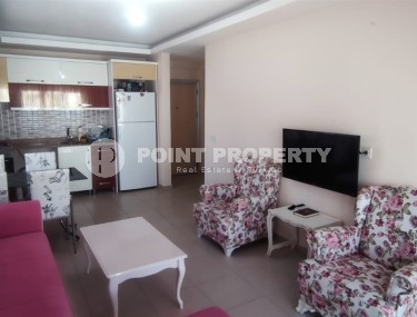 Квартира 1+1, площадью 60 кв.м. в Махмутларе, Алания-id-8552-photo-1