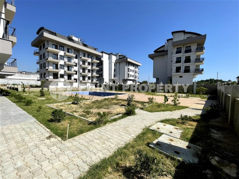 Apartment 1+1, 49 m², in a complex with infrastructure at the commissioning stage in the Oba area, Alanya-id-1668-photo-16
