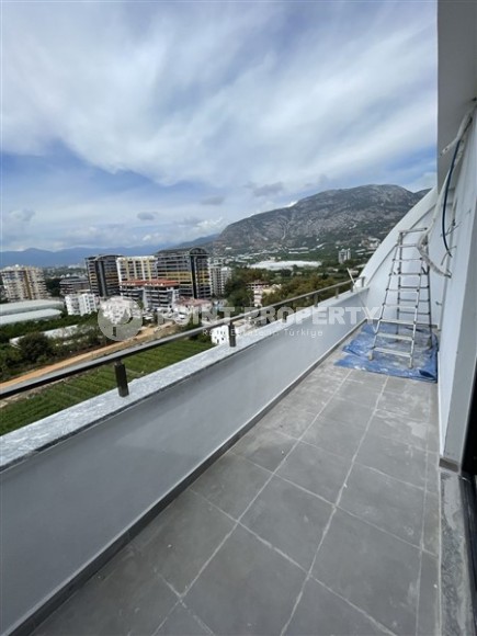 Просторные дуплексные квартиры в Махмутларе-id-8557-photo-5