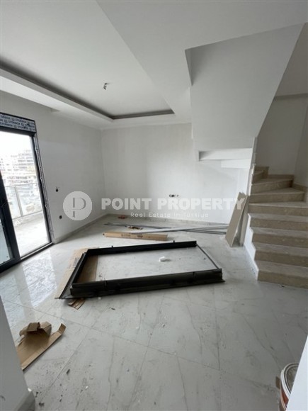 Просторные дуплексные квартиры в Махмутларе-id-8557-photo-11