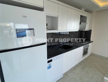 Новая квартира 125 м² с видом на море в шаговой доступности от пляжа в Махмутларе-id-8559-photo-3