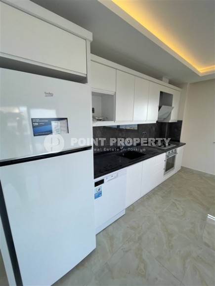 Новая квартира 125 м² с видом на море в шаговой доступности от пляжа в Махмутларе-id-8559-фото-3