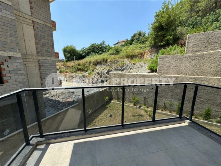 Потрясающая двухуровневая квартира 120 м² с садом в центре Аланьи-id-8573-фото-9